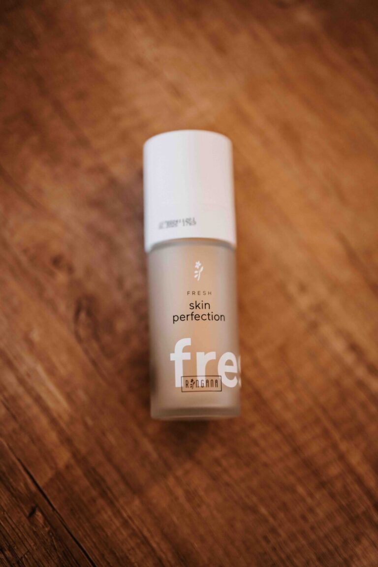 RINGANA FRESH skin perfection cream bottle seen from above on a wooden table